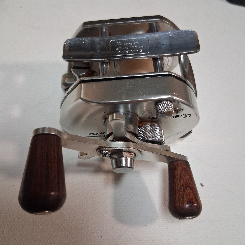 Vintage Shimano Bantam 100 Baitcasting Reel Made in Japan Wood Handles Manual